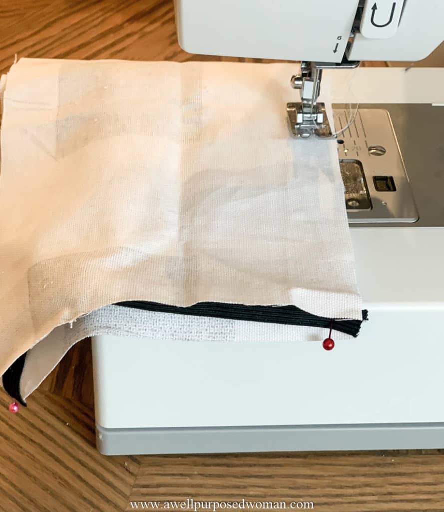 Sewing a DIY Face Mask with elastic pinned in the top and bottom corners