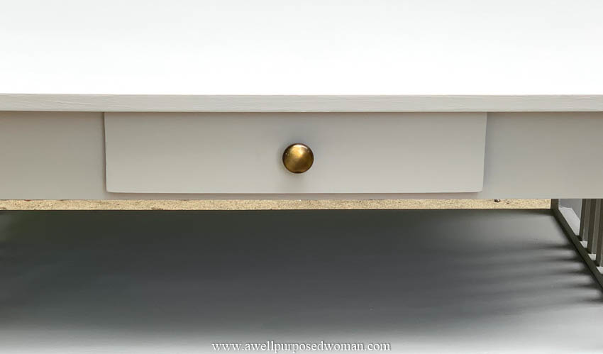 Closeup of gray coffee table makeover knob